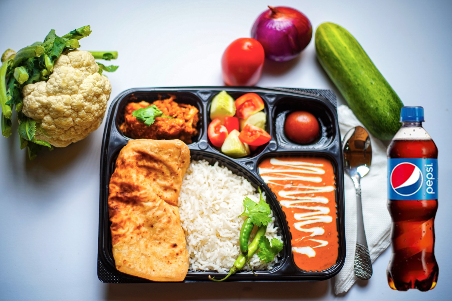 Premium veg thali + pepsi (250ml)