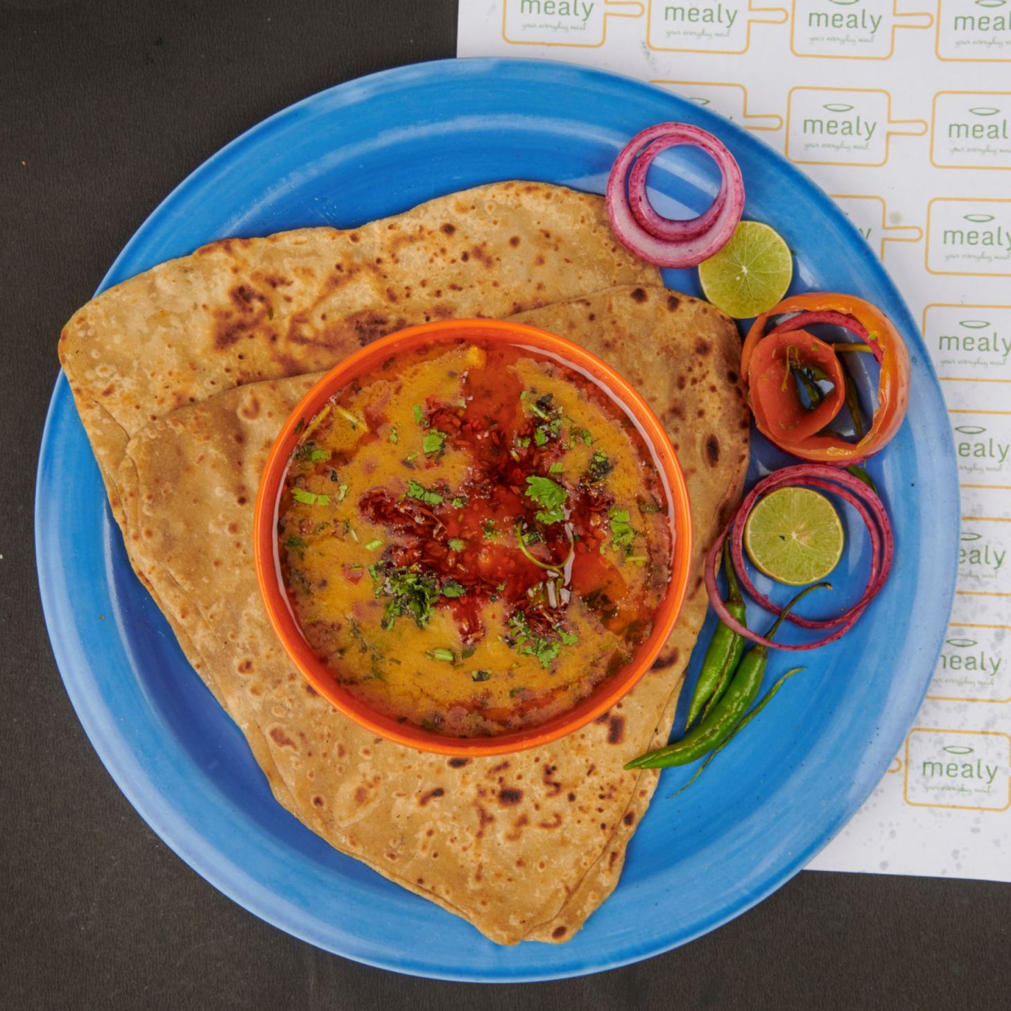 Yellow dal tadka with tawa parathas